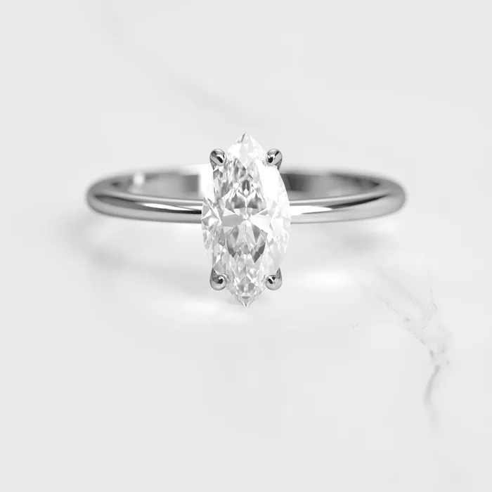 Marquise Tapered Solitaire Diamond Ring Capucinne Rings